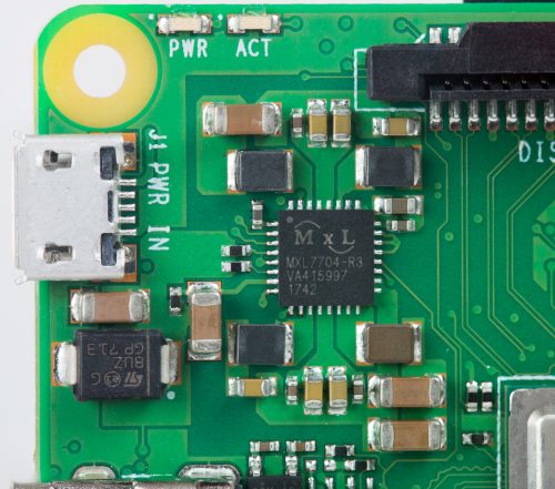 Close-up of the power supply chip on the Raspberry Pi 3 Model B+