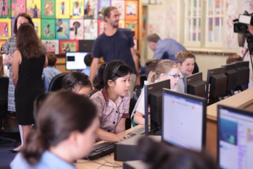 A computing classroom filled with learners.